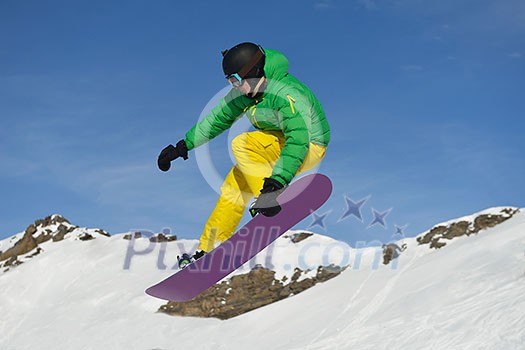 jumping skier at mountain winter snow fresh suny day jumping skier at mountain winter snow fresh suny day