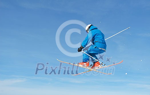 jumping skier at mountain winter snow fresh suny day jumping skier at mountain winter snow fresh suny day