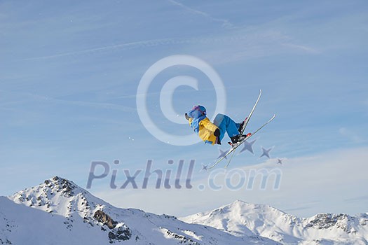 jumping skier at mountain winter snow fresh suny day jumping skier at mountain winter snow fresh suny day