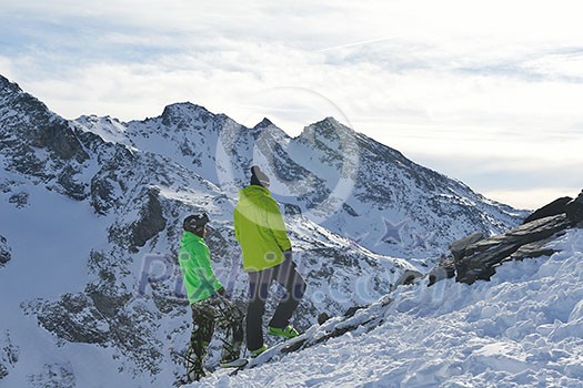 healthy people at top of mountain view at winter with fresh snow at beautiful sunny day healthy people at top of mountain view at winter with fresh snow at beautiful sunny day