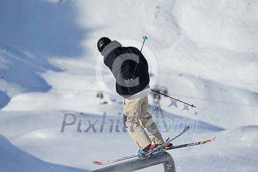 jumping skier at mountain winter snow fresh suny day jumping skier at mountain winter snow fresh suny day