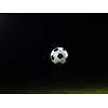 classic soccer football ball isolated on black background