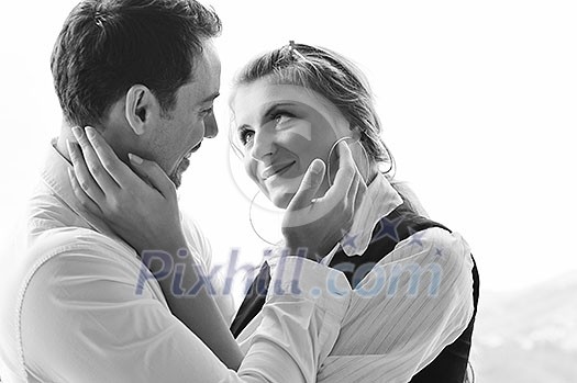 romantic happy couple relax and have fun at balcony in their new home apartment romantic happy couple relax and have fun at balcony in their new home apartment