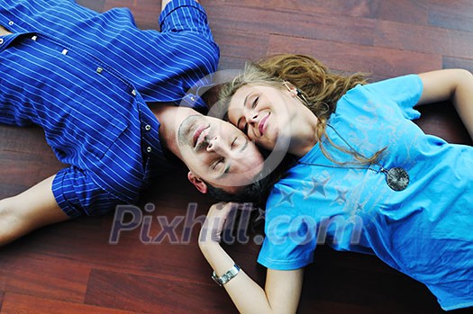 happy young cuple have fun and relax in their new big bright home apartment happy young cuple have fun and relax in their new big bright home apartment