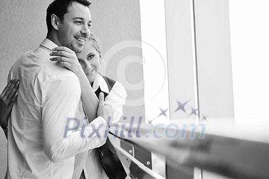 romantic happy couple relax and have fun at balcony in their new home apartment romantic happy couple relax and have fun at balcony in their new home apartment