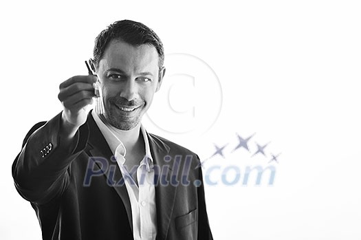 young business man isolated on white holding new home keys and representing sucess in real estate industry young business man isolated on white holding new home keys and representing sucess in real estate industry