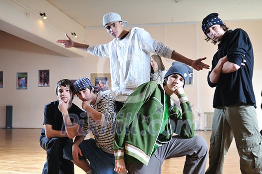 group of young happy boys posing together in dence studio group of young happy boys posing together in dence studio