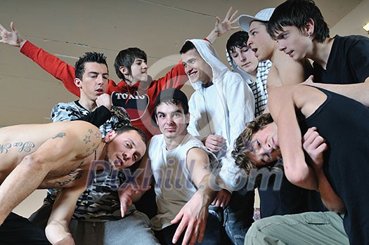 group of young happy boys posing together in dence studio group of young happy boys posing together in dence studio