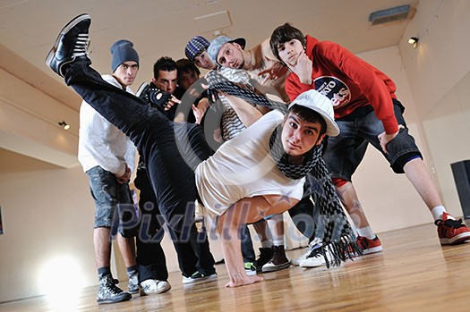 group of young happy boys posing together in dence studio group of young happy boys posing together in dence studio