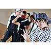 group of young happy boys posing  together in dence studio