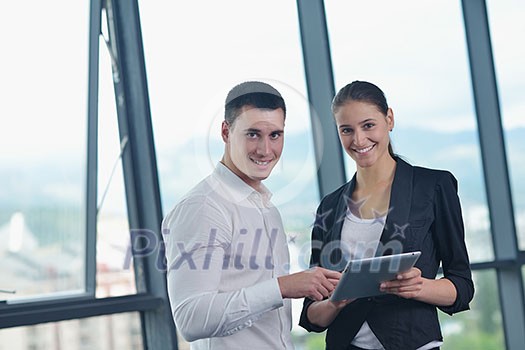 Group of happy young business people in a meeting at office Group of happy young business people in a meeting at office