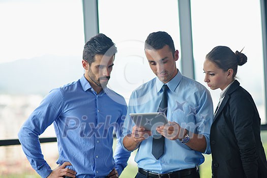 Group of happy young business people in a meeting at office Group of happy young business people in a meeting at office