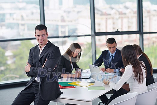 business people group joining hands and stay as team in circle and representing concept of friendship and teamwork business people group joining hands and stay as team in circle and representing concept of friendship and teamwork