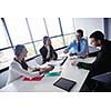 Group of happy young  business people in a meeting at office