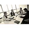 Group of happy young  business people in a meeting at office