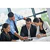 Group of happy young  business people in a meeting at office