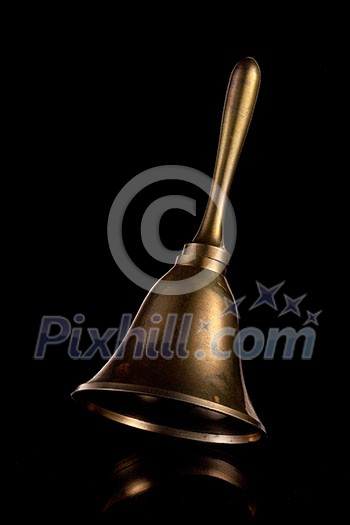 Hand Bell isolated on a black background Hand Bell isolated on a black background