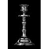 Silver candlestick isolated on black background
