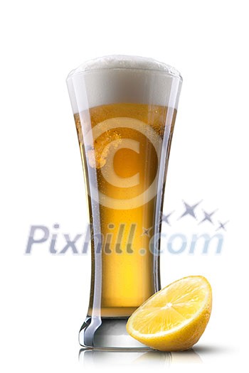 Beer in glass with lemon isolated on white background Beer in glass with lemon isolated on white background