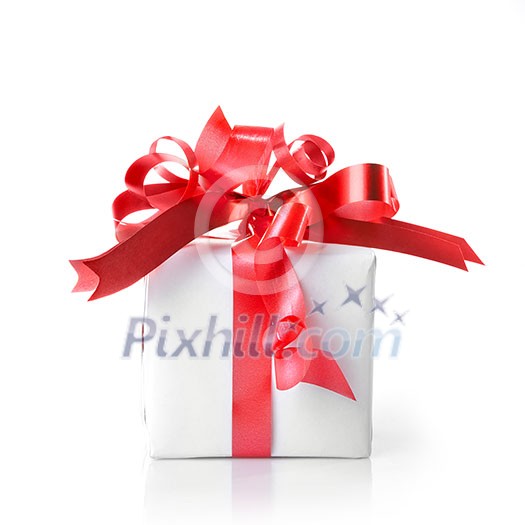 Holiday gift with red ribbon isolated on white Holiday gift with red ribbon isolated on white