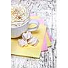 hot chocolate with marshmallows and cream on wooden background