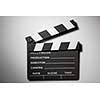 Clapperboard cinema on white