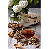Cup of tea and cookies made of nuts and raisins. Kozinaki.