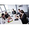 Group of happy young  business people in a meeting at office