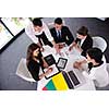Group of happy young  business people in a meeting at office