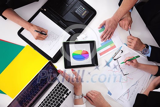Group of happy young business people in a meeting at office Group of happy young business people in a meeting at office