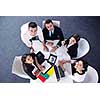 Group of happy young  business people in a meeting at office