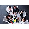 Group of happy young  business people in a meeting at office