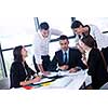 Group of happy young  business people in a meeting at office