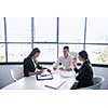 Group of happy young  business people in a meeting at office