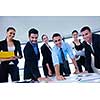 Group of happy young  business people in a meeting at office