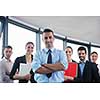 Group of happy young  business people in a meeting at office
