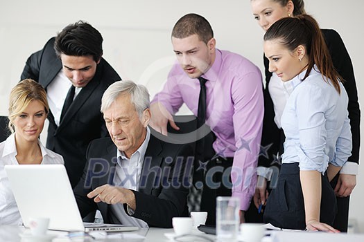 business people team at a meeting in a light and modern office environment. business people team at a meeting in a light and modern office environment.