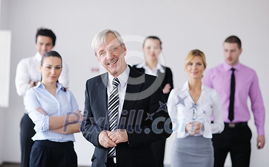 business people team at a meeting in a light and modern office environment. business people team at a meeting in a light and modern office environment.
