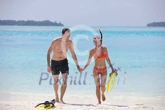 happy young romantic couple in love have fun running and relaxing on beautiful beach happy young romantic couple in love have fun running and relaxing on beautiful beach
