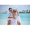 happy young romantic couple in love have fun running and relaxing on beautiful beach
