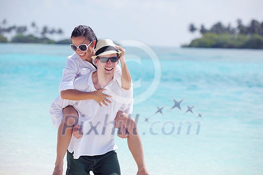 happy young romantic couple in love have fun running and relaxing on beautiful beach happy young romantic couple in love have fun running and relaxing on beautiful beach