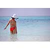 beautiful and happy woman girl on beach have fun and relax on summer vacation  over the sea