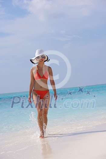 beautifel and happy woman girl on beach have fun and relax on summer vacation over the sea beautifel and happy woman girl on beach have fun and relax on summer vacation over the sea