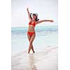 beautiful and happy woman girl on beach have fun and relax on summer vacation  over the sea