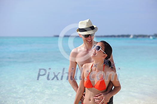 happy young romantic couple in love have fun running and relaxing on beautiful beach happy young romantic couple in love have fun running and relaxing on beautiful beach
