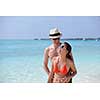 happy young romantic couple in love have fun running and relaxing on beautiful beach