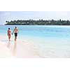 happy young romantic couple in love have fun running and relaxing on beautiful beach
