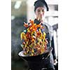 beautiful young chef woman prepare and decorating tasty food in kitchen