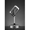 Retro microphone on grey