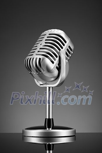 Retro microphone on grey Retro microphone on grey